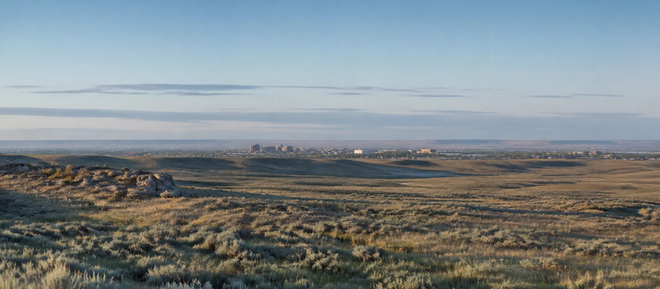 Wyoming high plains and distant civic landscape